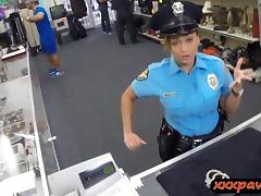 Lady police officer gets nailed in a pawnshop to earn cash
