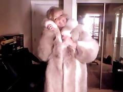 Sexy Woman showing off her Wolf Fur Coat II