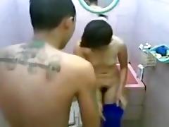 Petite ponytailed asian girl gets her hairy pussy eaten out and missionary fucked in the bathroom