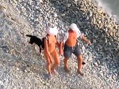 Nudist couple living the thug life. just fucking at the beach in public !!!