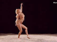 Busty blonde from Russia dances around the pole totally naked