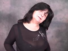 Matured brunette granny looking seductive before masturbating