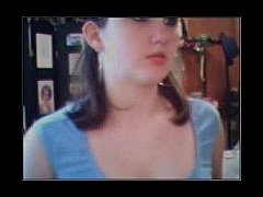 Young teenage cutie posing on her webcam