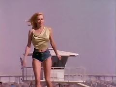 Vintage blonde Karen Foster poses for the cam in her denim shorts