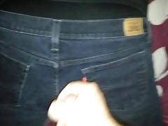 Cumshot on black jeans