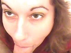 POV blowjob by a sexy brunette in the bedroom